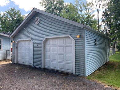 Detached 2 car garage has lotsof room for a worksh