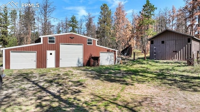 3-car detached garage and storage shed for tools a