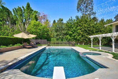 Spectacular pool, & spa, approximately 17x34, privacy, mature trees, play yard, patio, BBQ, fire pit