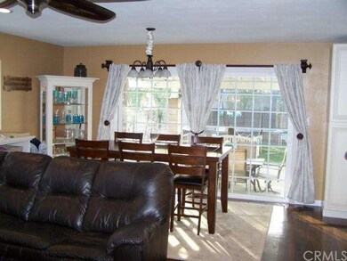Dining area, newer sliding doors, ceiling fan