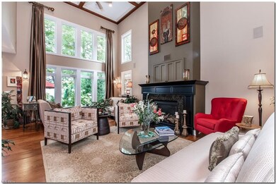 ABOVE THE CUSTOM FIREPLACE THERE IS BUILT- IN SPAC