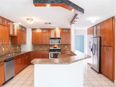 Kitchen features room for the whole family to gath