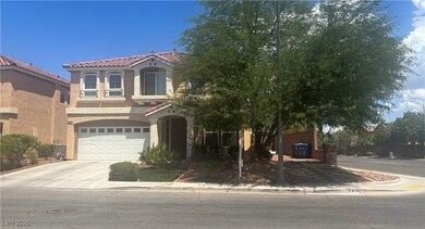 Mediterranean / spanish home with stucco siding, concrete driveway, a tiled roof, and a garage