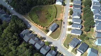 View of property location featuring nearby suburban area