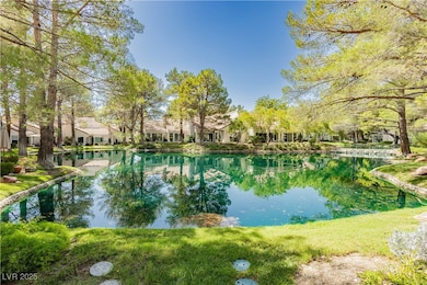 Water view with nearby suburban area