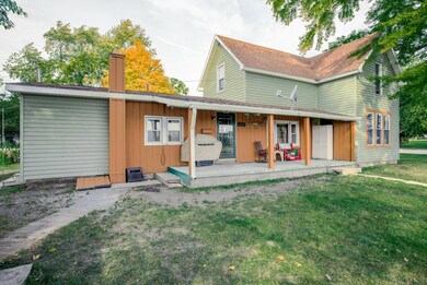 707 E Walnut St, Chalmers, IN 47929 - photo 2