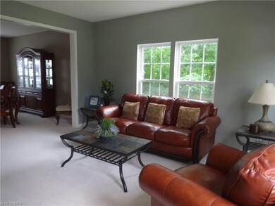 Living room open to dining room