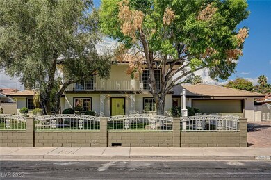 Front of house with fully enclosed front yard with