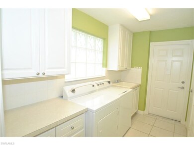 Large laundry room leading to 2 car attached garage