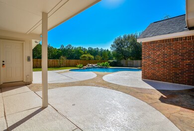 The backyard is huge, over 1/4-acre!  It has plenty of pool deck space for the largest of patio furniture and beautiful tree-line in back, making it serene and inviting!