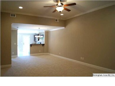 Spacious den with volume ceilings