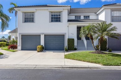 Mediterranean / spanish-style home featuring a gar