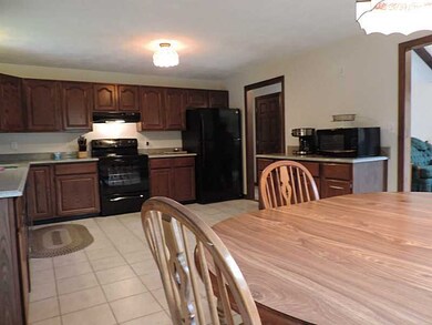 Kitchen. The kitchen is opened beautifully into th