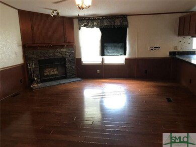 Large Living area with Decorative Fireplace