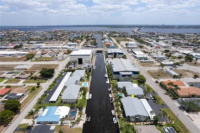 Discover this BEAUTIFULLY UPDATED FIRST FLOOR GULF-ACCESS condo in the highly desirable MARINA 46 CONDOMINIUM, nestled in the CAPE CORAL'S WATERFRONT PARADISE!