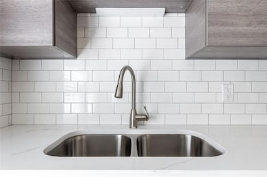 Interior details with light stone counters and sin