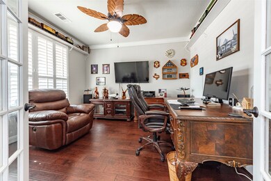 Convenient home-office with front yard views featu