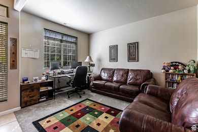 Tiled office featuring carpet floors
