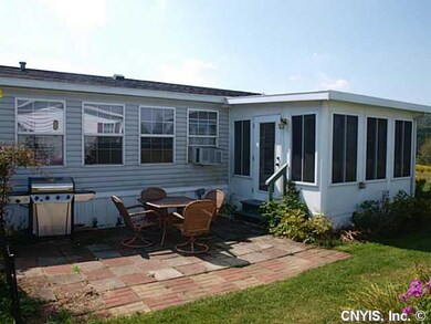 Exterior Back. New Florida three season room adds 
