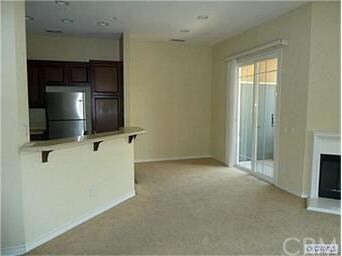 Dining area off kitchen with balcony.