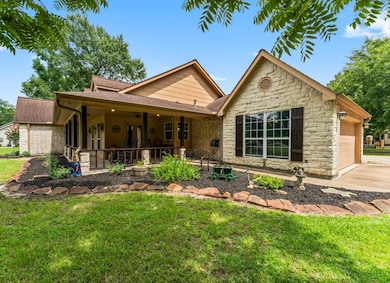 This charming home features a lovely brick facade,