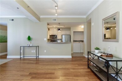 Kitchen Open to Living & Dining Room. Kitchen offers granite counters & stainless appliances. Seller removed laundry room doors( still have them)