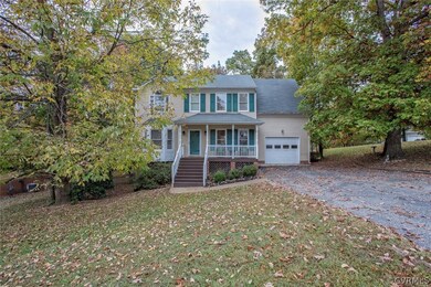 Paved driveway & 1 car garage