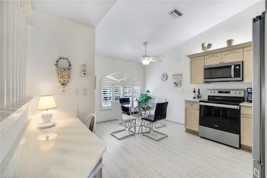 Morning sun graces the kitchen dining nook