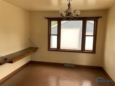 Dining Rm (note huge garage door!)