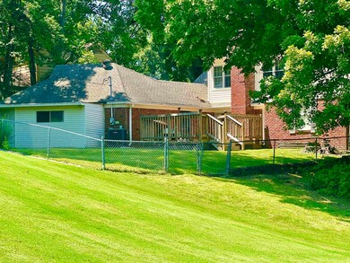Back of house with a deck, central air condition u