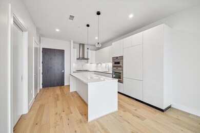 Spacious kitchen features soft close cabinets and