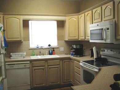 Kitchen with oak cabinets