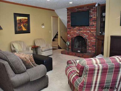 brick fireplace, crown molding, wired for surround