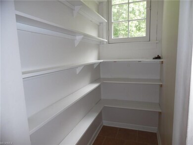 Pantry adjoining kitchen.