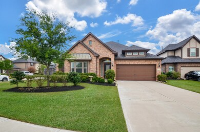 Beautiful landscaping provides lovely curb appeal for this home.