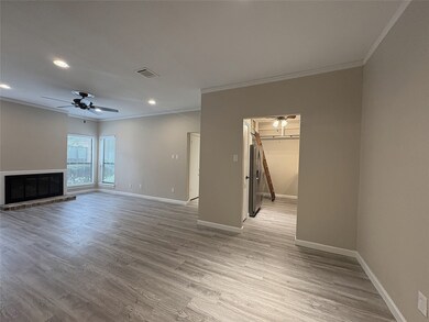 The living room and dining room combo creates an e