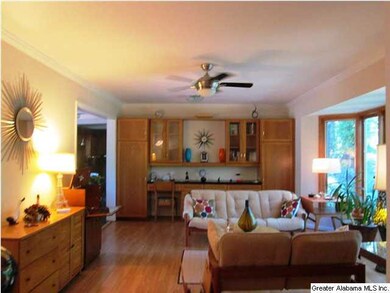Another view of living room showing built-in cabin
