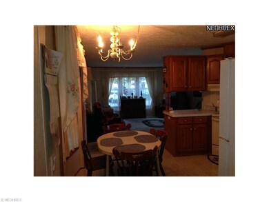 View of kitchen into living room