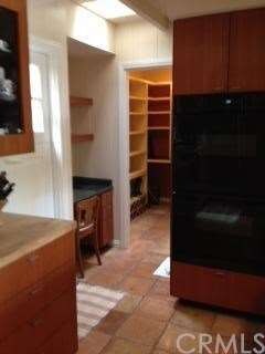 KITCHEN DOOR, BUILT-IN DESK, DOUBLE OVENS AND LARG