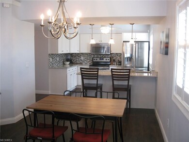 Living room is open to a delightful kitchen