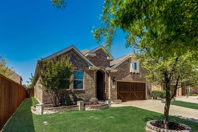 View of front of property with a front lawn