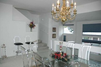 Dining area overlooks the living area