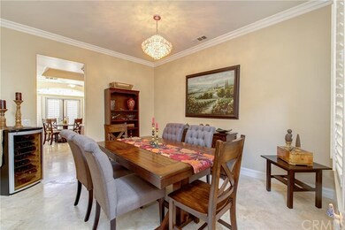 Formal dining room with oversized baseboards and d