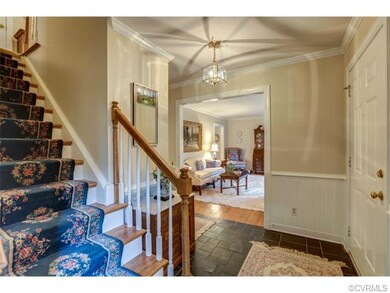 The gracious entryway is large enough for a 