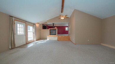 Huge family room w/ 2 sided gas fireplace great fo