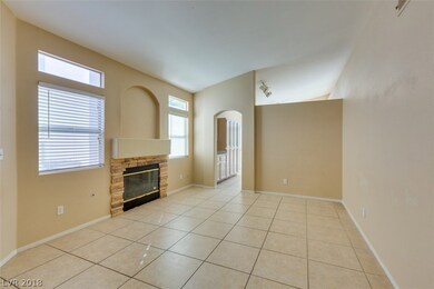 Enter into formal Living Room with fireplace, mant