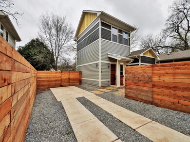 View of side of property with board and batten si