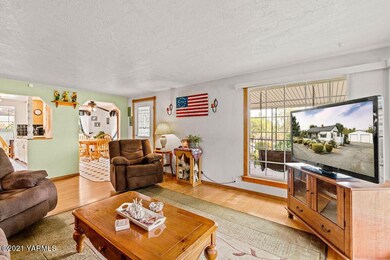 Formal living open to kitchen & dining
