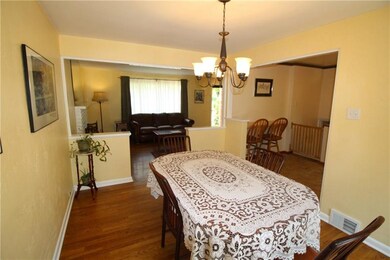 The dining room is open to the living room, and a 