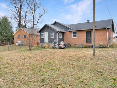 Back of property featuring central air condition u